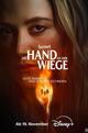Die Hand an der Wiege