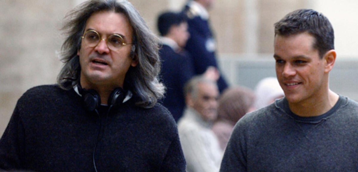 Paul Greengrass mit Matt Damon am Set